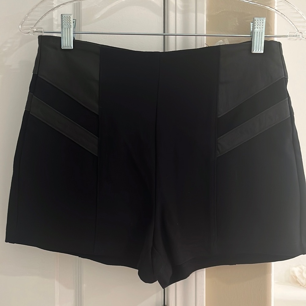 ANGL Shorts black brand new with Polyurethane detailed waist and zipper back!